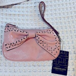 Chocolate New York new with tags wristlet sachel bag in pink bow front zipper